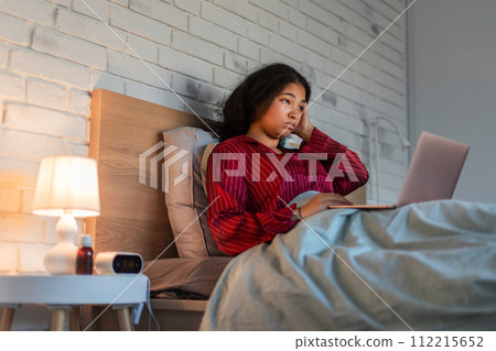 Woman can't fall asleep, insomnia a sleep problems. Concept of sleep routine and techniques for better sleep. World Sleep Day. 112215652