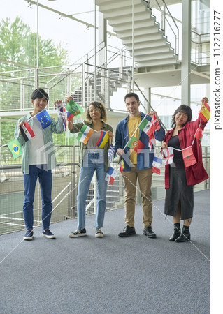 multinational people with bunting flags 112216277