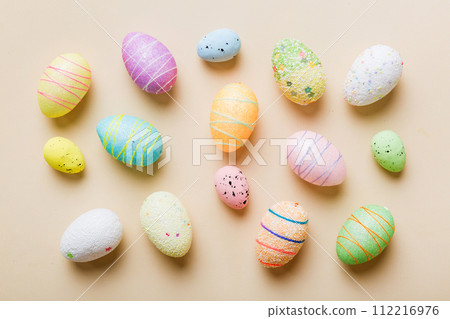 decorative easter eggs on colored background. easter eggs collection top view with copy space 112216976