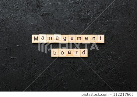 Management board word written on wood block. Management board text on cement table for your desing, concept Management board word written on wood block. Management board text on cement table for your desing, concept 112217605