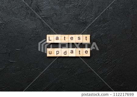 latest update word written on wood block. latest update text on table, concept latest update word written on wood block. latest update text on table, concept 112217699