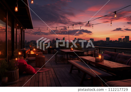 Sunset on the terrace of a restaurant with a view of the city Sunset on the terrace of a restaurant with a view of the city 112217729