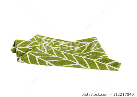 Green textile napkin isolated on white background. Folded decorative kitchen cotton towel. Top view Green textile napkin isolated on white background. Folded decorative kitchen cotton towel. Top view 112217849