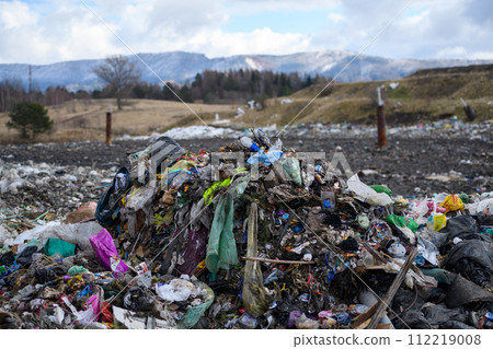Landfill, large pile of waste. Nature pollution, environmental concept, eco activism. 112219008