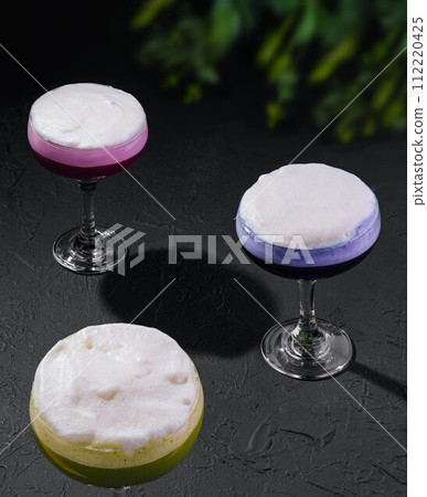 Colorful alcoholic cocktails for women with foam 112220425