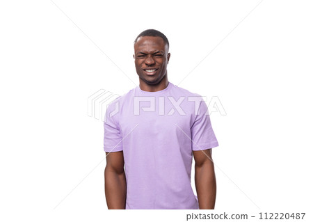 young handsome american man looks at the camera in surprise on a white background 112220487