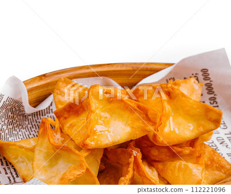 potato crisps with hot sauce isolated 112221096