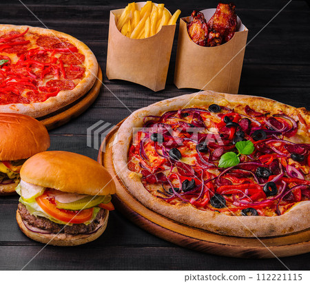 Table or delivery foods scene of assorted take out Table or delivery foods scene of assorted take out 112221115