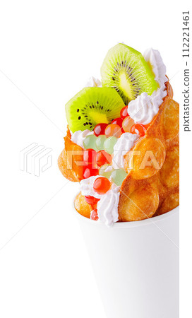 Bubble Waffle with kiwi, bubble tea and whipped cream 112221461