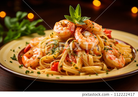 Pasta with shrimps on a plate on a wooden background Pasta with shrimps on a plate on a wooden background 112222417