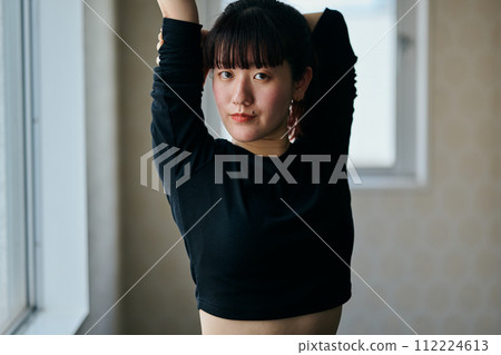 young woman practicing dance young woman practicing dance 112224613