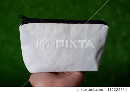 a beautiful and simple pouch as background a beautiful and simple pouch as background 112224824