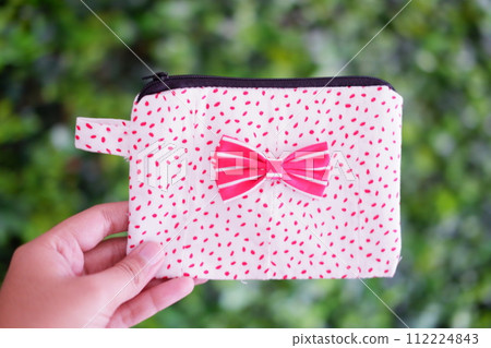a beautiful and simple pouch as background a beautiful and simple pouch as background 112224843