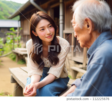 Young woman talking to an old man 112225676