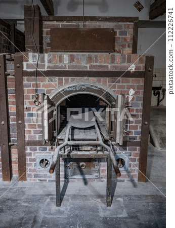 Dachau, Germany - Oven in the crematorium at the Dachau concentration camp for burning dead Dachau, Germany - Oven in the crematorium at the Dachau concentration camp for burning dead 112226741