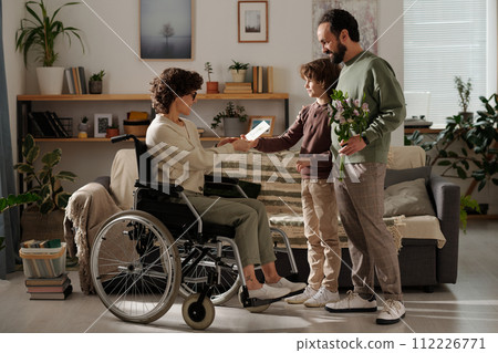 Congratulating their mother and wife 112226771