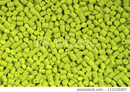 The pile of green pellets materials for plastic injection process. The pile of green pellets materials for plastic injection process. 112226807
