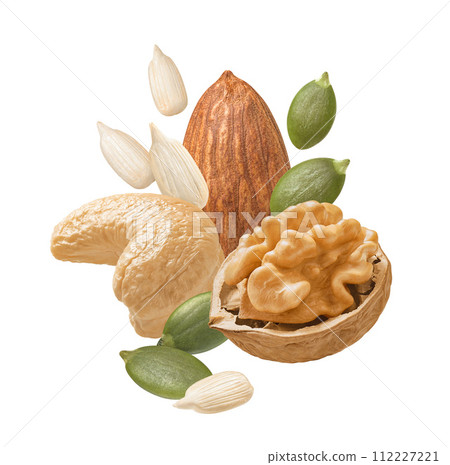 Walnut, almond, cashew nuts, pumpkin and sunflower seeds isolated on white background Walnut, almond, cashew nuts, pumpkin and sunflower seeds isolated on white background 112227221
