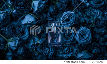 Perfume bottle in flowers, fragrance on blooming background, floral scent and cosmetic product 112228280