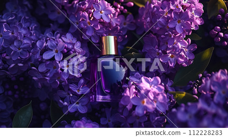 Perfume bottle in flowers, fragrance on blooming background, floral scent and cosmetic product Perfume bottle in flowers, fragrance on blooming background, floral scent and cosmetic product 112228283