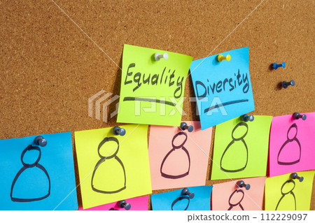 Stickers with inscriptions Equality and diversity are pinned to the board. Stickers with inscriptions Equality and diversity are pinned to the board. 112229097