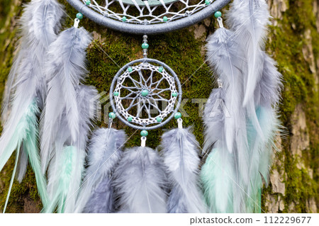 Handmade dream catcher with feathers threads and beads rope hanging Handmade dream catcher with feathers threads and beads rope hanging 112229677