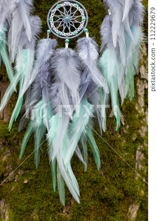 Handmade dream catcher with feathers threads and beads rope hanging Handmade dream catcher with feathers threads and beads rope hanging 112229679