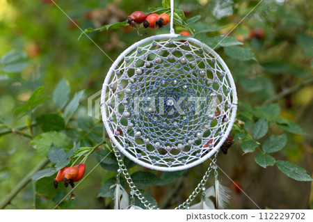 Handmade dream catcher with feathers threads and beads rope hanging 112229702