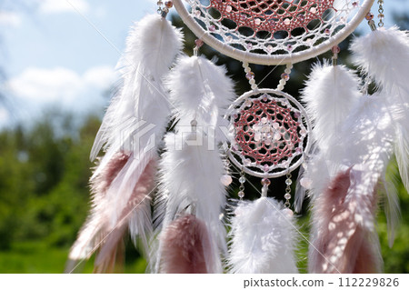 Handmade dream catcher with feathers threads and beads rope hanging 112229826