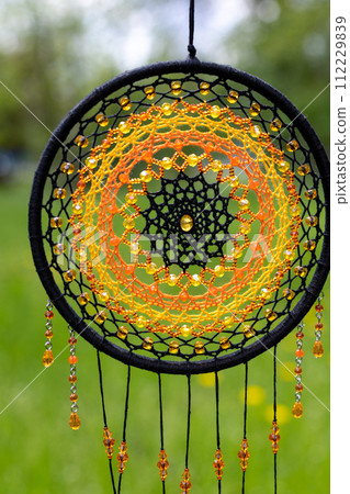 Handmade dream catcher with feathers threads and beads rope hanging 112229839