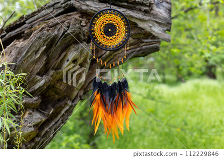 Handmade dream catcher with feathers threads and beads rope hanging 112229846