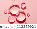 AI-generated content. Liquid hyaluronic gel bubbles over pink background. Aging, skin care concept 112229921