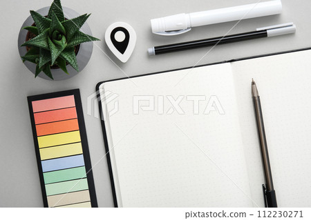 Empty notebook page for your text with black and white school and office stationery on gray background. Flatly. Empty notebook page for your text with black and white school and office stationery on gray background. Flatly. 112230271