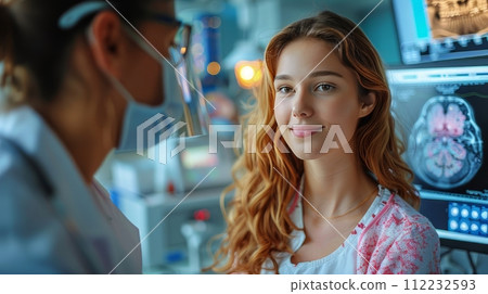 Red-Haired Woman Standing Next to Man in Lab 112232593