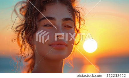 Woman Standing in Front of Sunset 112232622