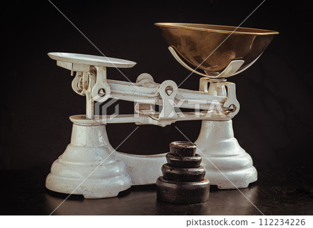 Old obsolete manual weighing scales and Iron Brass Tray with set of cast iron weights. Old obsolete manual weighing scales and Iron Brass Tray with set of cast iron weights. 112234226