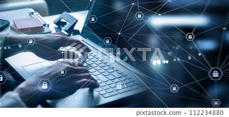 A programmer works on a computer that is protected. A programmer works on a computer that is protected. 112234880