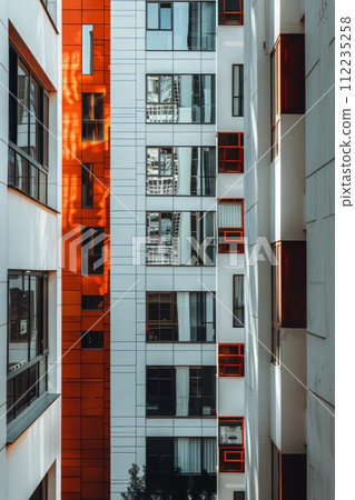 Orange and White Building With Trees in Front Orange and White Building With Trees in Front 112235258