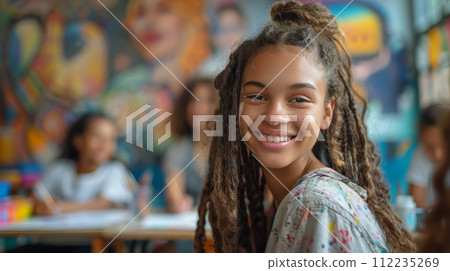 Children Sitting at Table in Classroom 112235269