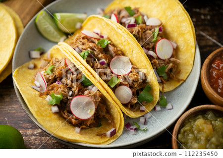 carnitas tacos with salsa and lime carnitas tacos with salsa and lime 112235450
