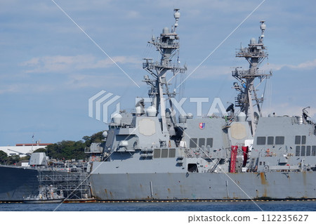 Arleigh Burke-class missile destroyer USS Ralph Johnson moored at Yokosuka Naval Facility Arleigh Burke-class missile destroyer USS Ralph Johnson moored at Yokosuka Naval Facility 112235627