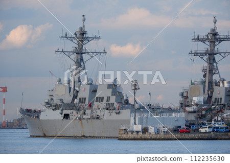 Arleigh Burke-class missile destroyer USS Ralph Johnson moored at Yokosuka Naval Facility Arleigh Burke-class missile destroyer USS Ralph Johnson moored at Yokosuka Naval Facility 112235630