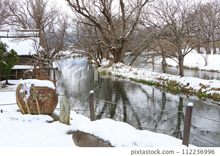 Daio Wasabi Farm - Watermill with snowy scenery Daio Wasabi Farm - Watermill with snowy scenery 112236996
