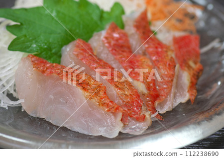 Grilled golden sea bream sashimi 112238690