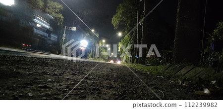 Near the edge of the city in the night view 112239982