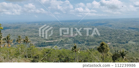 Beautiful view from the top of a high hill 112239986