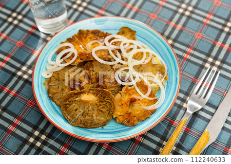 Pickled russula delica with onions 112240633