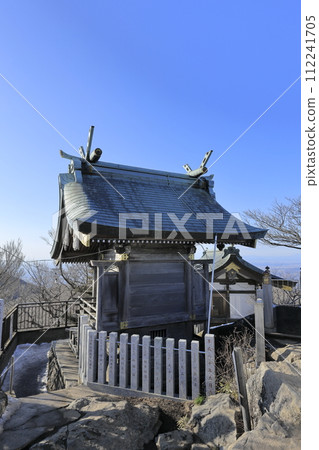 The back of the main shrine of Mt. Nyotai of Tsukuba-san Shrine, which is enshrined on the summit of Mt. Nyotaisan of Mt. Tsukuba on a clear winter day. The back of the main shrine of Mt. Nyotai of Tsukuba-san Shrine, which is enshrined on the summit of Mt. Nyotaisan of Mt. Tsukuba on a clear winter day. 112241705