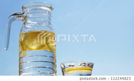 Lemon water to prevent heatstroke Midsummer blue sky background 112244823