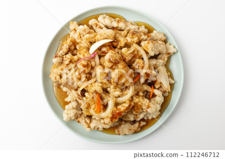 Sweet and sour pork on a white background Sweet and sour pork on a white background 112246712